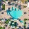 a swimming pool in front of a building