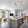 a kitchen with a dining table and chairs